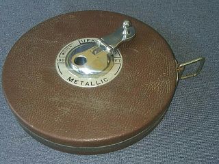 Vintage Lufkin Metallic 100 Ft.  Cloth Tape Measure.