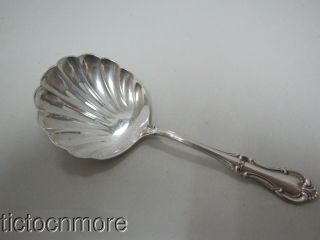 Vintage International Joan Of Arc Sterling Silver Pierced Shell Nut Spoon.  70oz