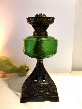 Antique Green Glass Oil Lamp On Triangle Metal Base