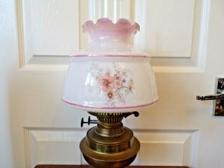 A pretty vintage brass oil lamp with ornate glass shade order 3