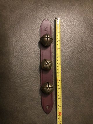 3 Vintage Brass Sleigh Bells On A Leather Strap Stamped With B In A Diamond
