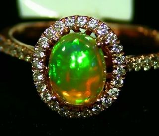 1.  37ct 14k Gold Natural Ethiopian Opal Diamond Designer Halo Vintage Retro Ring