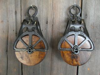 Two Antique Vintage Cast Iron/ Wood Pulley Primitive Ornate Rustic Barn Decor
