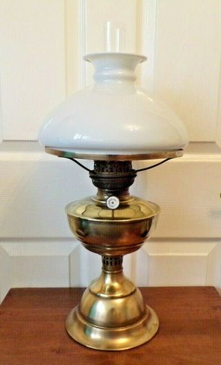 A Lovely Large Brass Oil Lamp With A Milk Glass Shade In Order