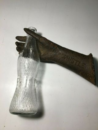 Antique Cast Iron Hand Display For Whistle Soda Along With Bottle