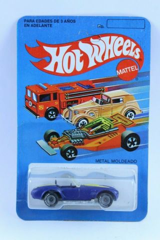Hot Wheels Mexico Classic Cobra Real Rider Blue W/ Yellow Stripe On Card