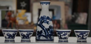 Vtg.  Japan Saki Set Blue White Bottle 4 Tea Cups Ceramic Paper Labels