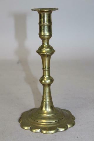 An Early 18th C English Qa Brass Candlestick Baluster Form Great Petal Base