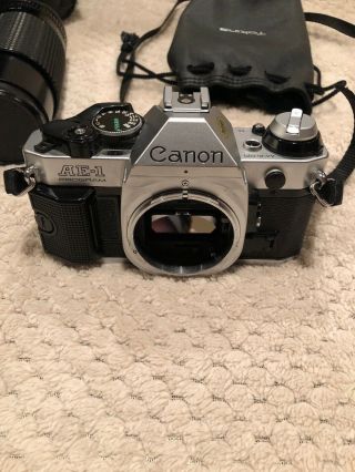 Vintage Canon AE - 1 35mm Camera,  Canon FD 28mm Lens 1:2.  8,  & Toyo Optics Lens 2