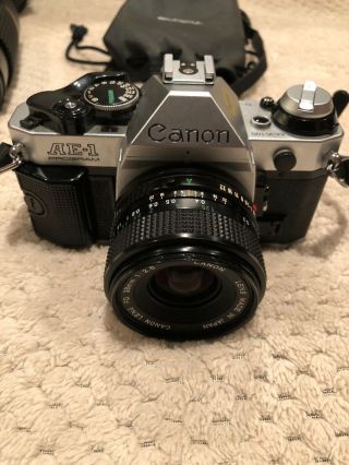 Vintage Canon AE - 1 35mm Camera,  Canon FD 28mm Lens 1:2.  8,  & Toyo Optics Lens 3