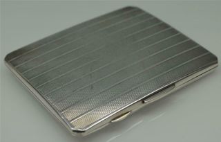A Quality Art Deco Sterling Silver Pin Stripe Cigarette Case With Gilt Interior