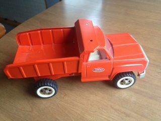 Vintage Metal Red Tonka Hydraulic Dump Truck With Stickers.