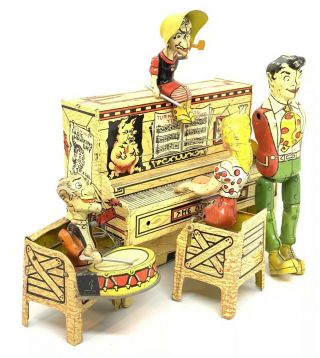 Vintage Lil‘ Abner & The Dog Patch 4 Man Band Tin Litho Wind Up Toy.  It