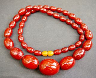 Antique Faturan Cherry Amber Bakelite Beads Necklace 87.  8 Grams Huge Center Bead