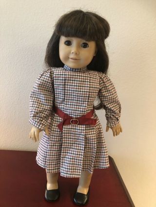 Retired American Girl Doll,  Samantha And Additional Outfits.