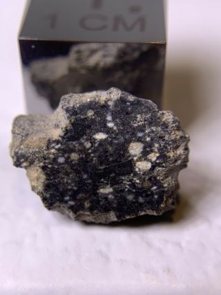 Meteorite Lunar Feldspathic Breccia,  Nwa 11273 0.  764 Gram Quality Endcut