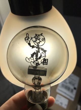 Rare 1940’s Reddy Kilowatt Aerolux Figural Filament Light Bulb -