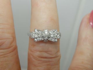 A Stunning 9 Ct White Gold Diamond Bow Ring