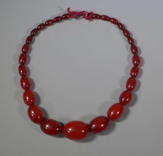 Vintage String Of Cherry Amber Faturan Bead Necklace 48 Grams