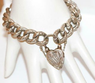 Antique Victorian Sterling Silver Repousse Puffy Heart Padlock Charm Bracelet