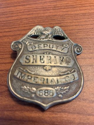 Vintage deputy sheriffs badge imperial County number 686 2