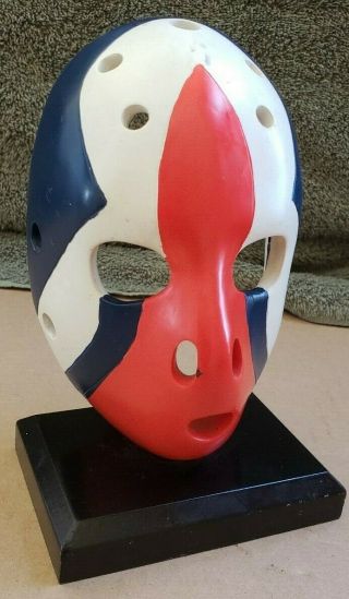 Vintage Nhl Hockey Goalie Mask On Wooden Stand Plaster