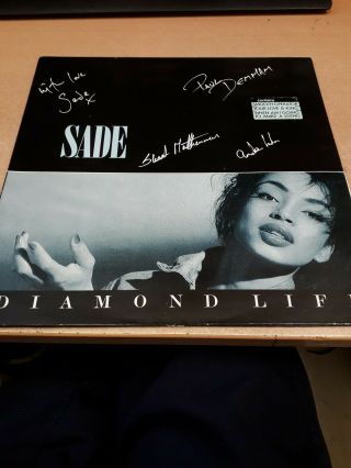 Sade Fully Signed Diamond Life Vinyl Album.  V.  G.  C.