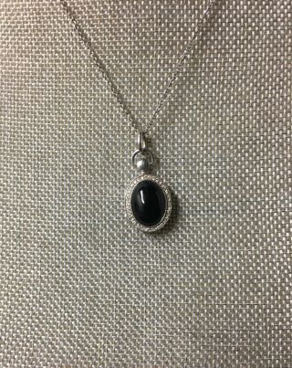 Monica Rich Kosann Black Onyx Petite Stone Locket,  $695