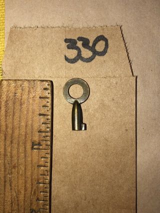 Old Tiny Antique Brass Miniature Hollow Barrel Padlock Key.  3/4” Skeleton