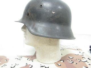 WWII German M - 1942 helmet shell with paint and liner band 2