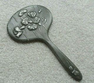 Antique Art Nouveau Pewter Backed Hand Mirror Embossed With Flowers And Leaves.