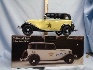 Jim Beam/i.  A.  J.  B.  B.  S.  C.  1934 Yellow Police Patrol Car Decanter