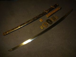 Japanese WWll Naval officer ' s sword in mountings 2