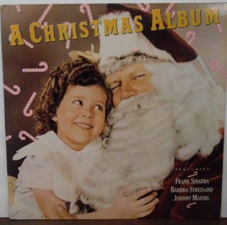 A Christmas Album Featuring Frank Sinatra,  Barbara Streisand Johnny M 031718lle