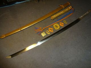 Japanese WWll Army officer ' s sword in mounting,  hand forged 
