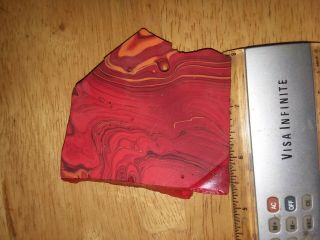 Red black and yellow slag glass chunk.  rare colors 2