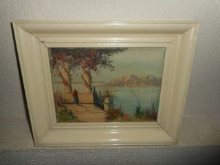 Old oil painting,  { Coast landscape with a woman and sailboats,  is signed }. 2