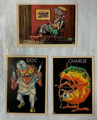 3 Different 1965 Topps Black Ugly Stickers Charlie,  Granny & Doc