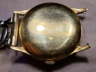 Rare Universal Geneve 18k solid gold watch.  Swiss made, .  Runs 3