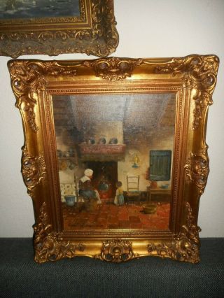 Large old oil painting,  { Mother & child near the fire,  is signed,  frame }. 2