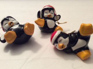 Christmasornaments Trio Of Playful Penguins With Santa Caps 2” Each