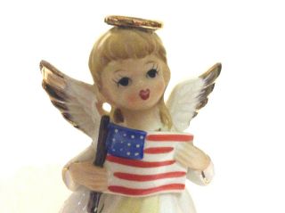 Vintage Ceramic Angel Figurine Girl holding the American Flag made in Japan 2