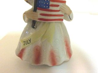Vintage Ceramic Angel Figurine Girl holding the American Flag made in Japan 3