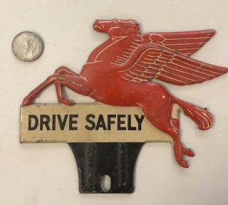 Vintage Pegasus Horse Mobil Drive Safely Tin Auto License Plate Topper