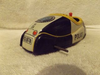 VINTAGE PRESSED STEEL - - 1950 ' s - - BATTERY OPERATED POLICE CAR - - TIN - - JAPAN - - PROJECT 3