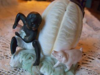 Bisque Figure Of A Black Boy And Pig In Pumpkin Patch Cigarette Holder.