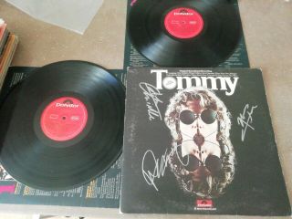 The Who Tommy Autographed Daultry Townshend Entwistle.  Rare.