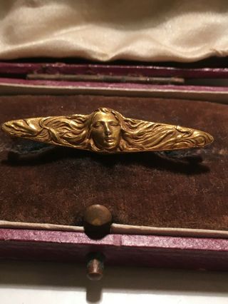 An Antique 14kt Yellow Gold Art Nouveau Brooch Female Head With Flowing Hair