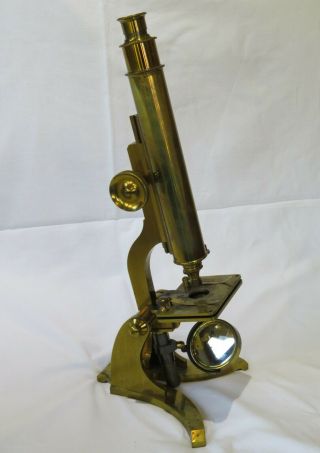 Antique brass microscope made by J White of Glasgow with lenses in case 3