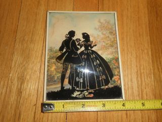 Vintage Reverse Painted Convex Glass Silhouette Picture Couple Flower